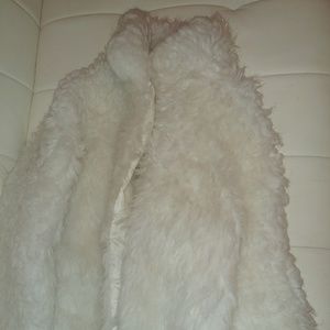 White faux fur coat